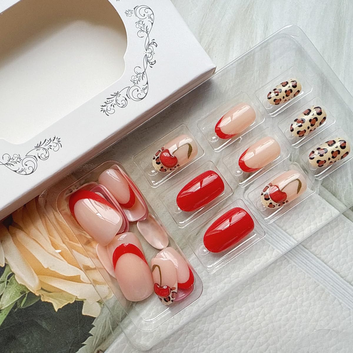 Short Press on Nails Oval Fake Nails with Cherry Leopard Print Design Glossy Red Acrylic Gel False Nails Kits Red French Tip Nails Spring Summer Reusable Artificial Stick on Nails for Women 24PCS